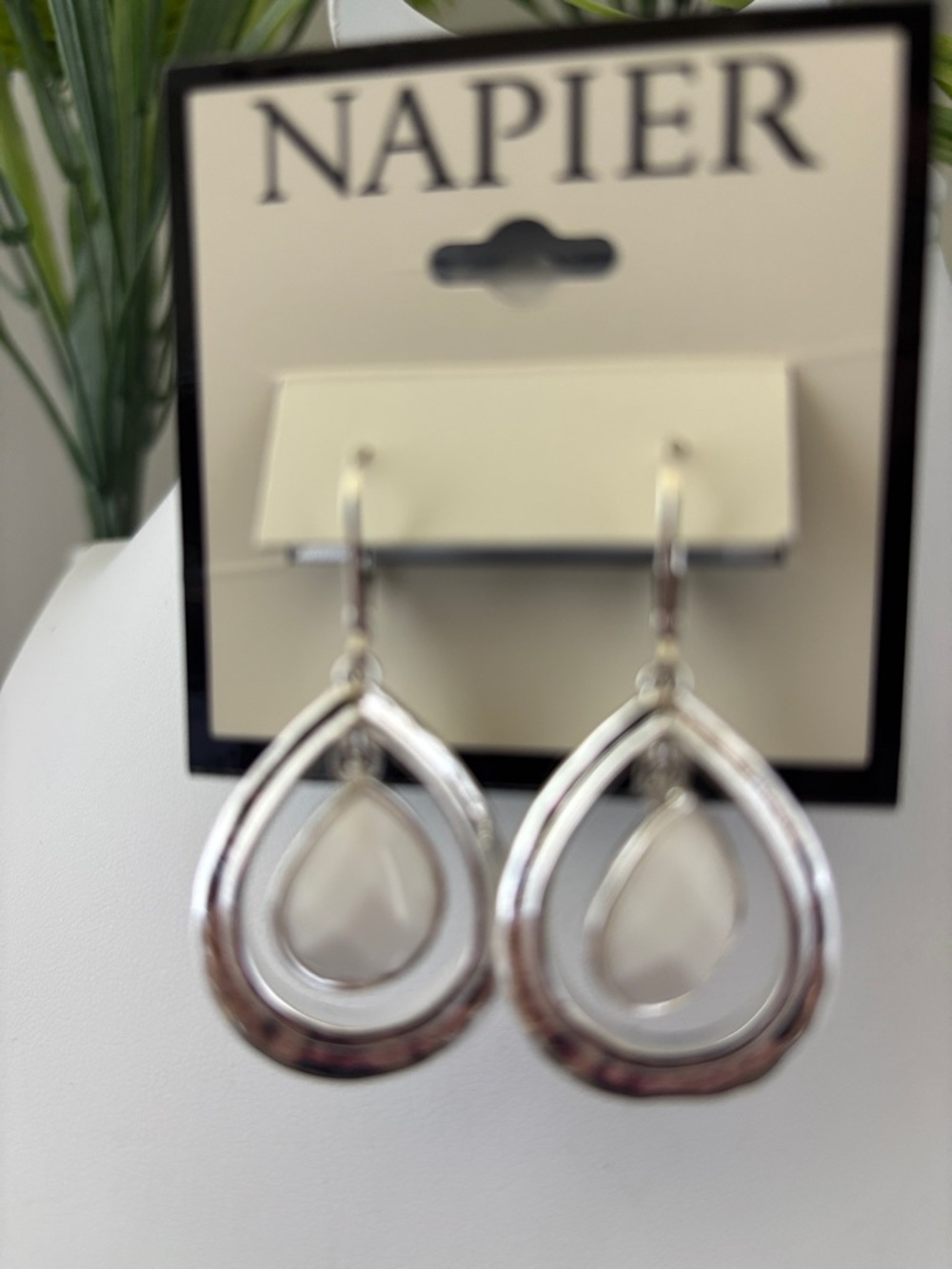Napier Silvertone double teardrop with milky white stone, lever back